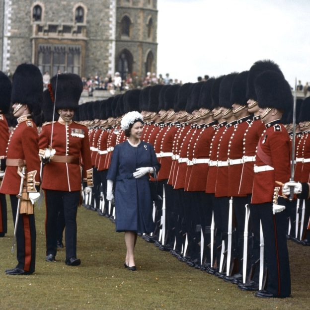 Inspecting the 1st and 2nd Battalions Coldstream Guards, at Windsor, as Sovereign.